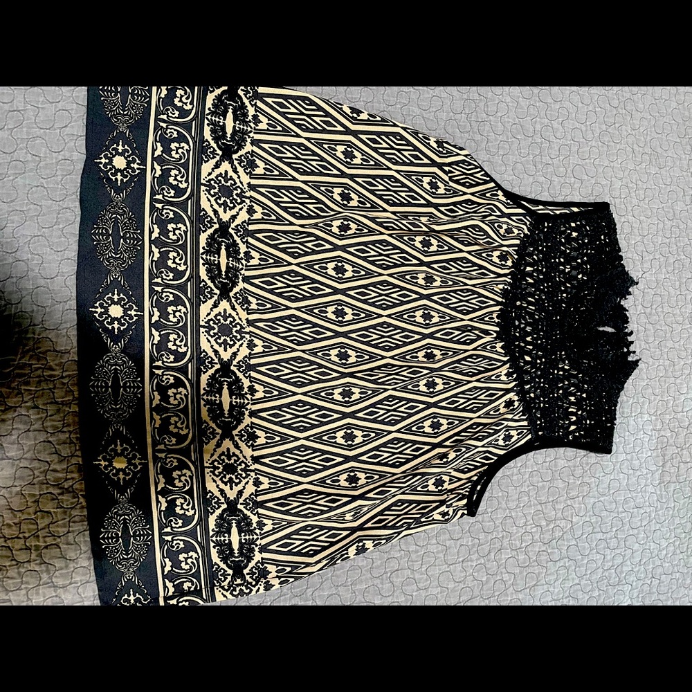 Sleeveless mock neck top